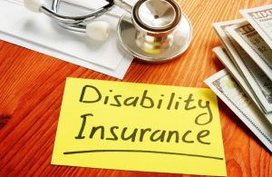 disability insurance note and money